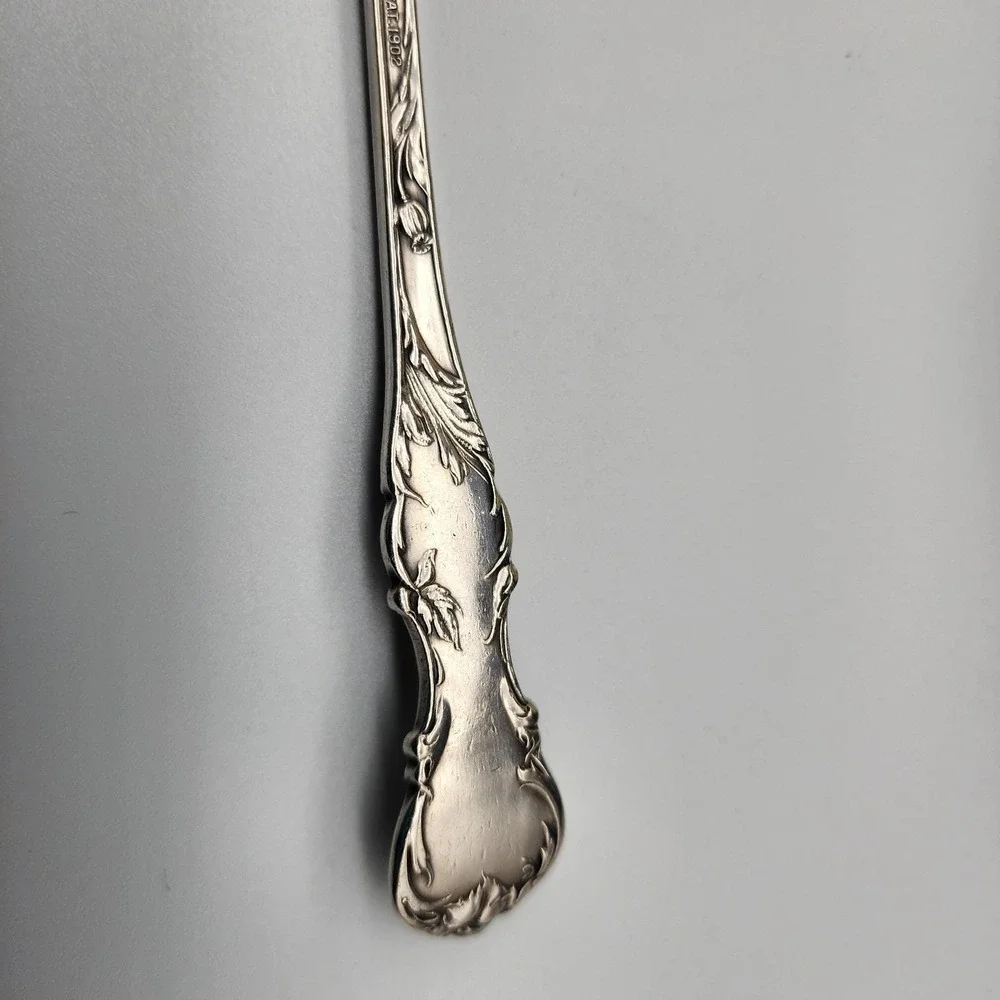 Silver serving fork by R. Wallace 1835 A1 Blossom pattern 8.75